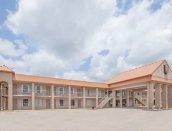 Motel Super 8 By Wyndham New Iberia Exterior foto