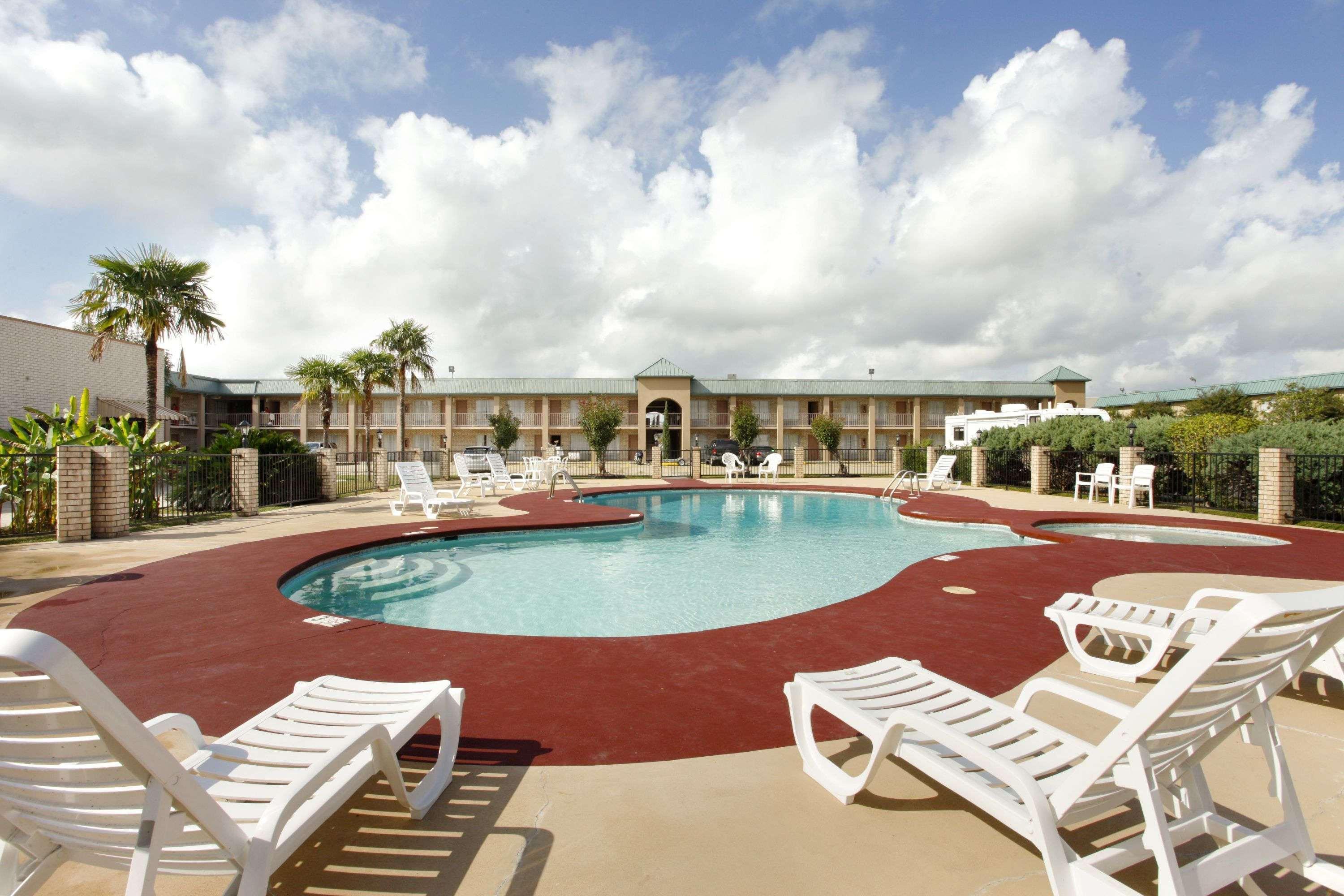 Motel Super 8 By Wyndham New Iberia Exterior foto